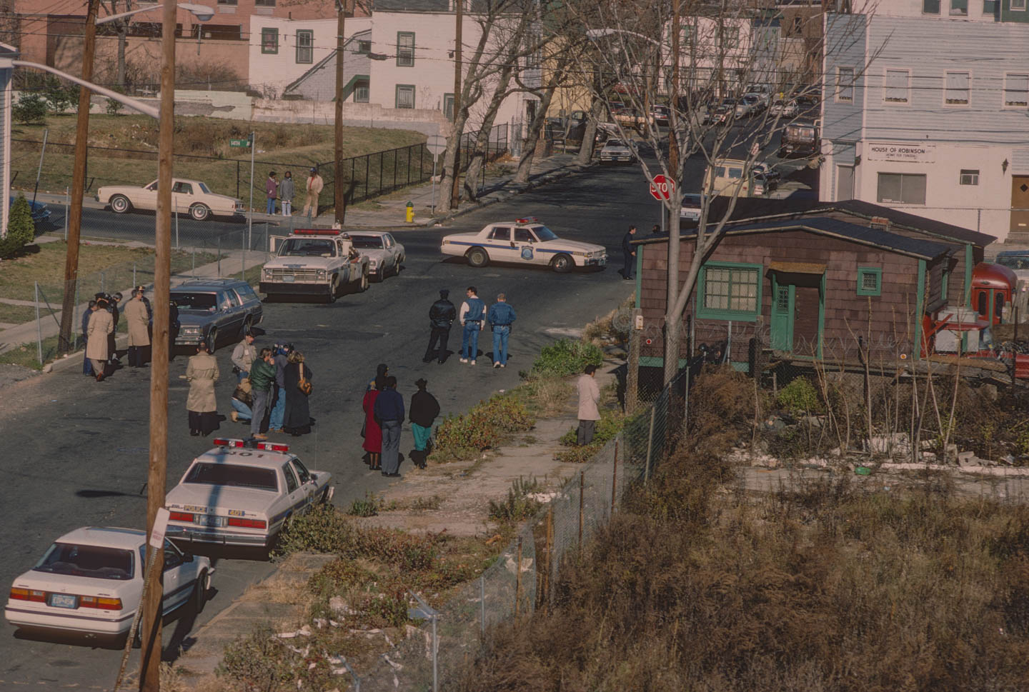 2-Police trying to evict Kea from her house after the Ark has been taken down, Camden St. at 14th Ave., Newark, 1988_