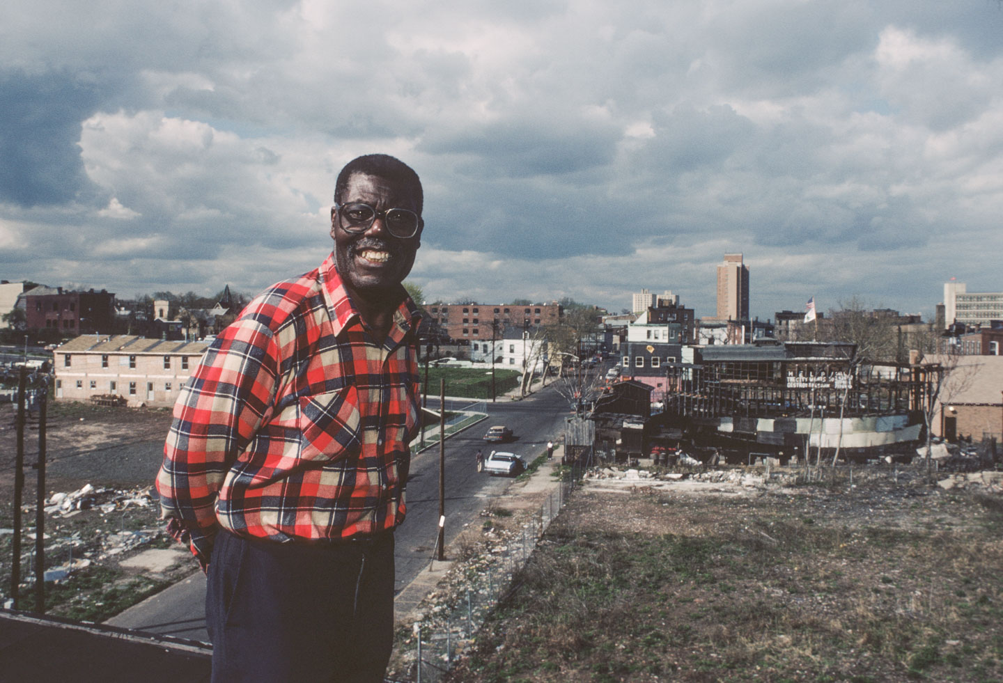 29-Tom Taylor standing on the roof of his Camden St. home, view towards 14th Ave., 1987_